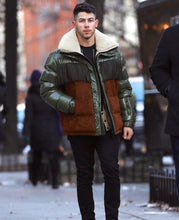 Nick Jonas Green puffer jacket