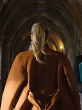 Anatomy of a Scandal Sophie Whitehouse Orange Coat